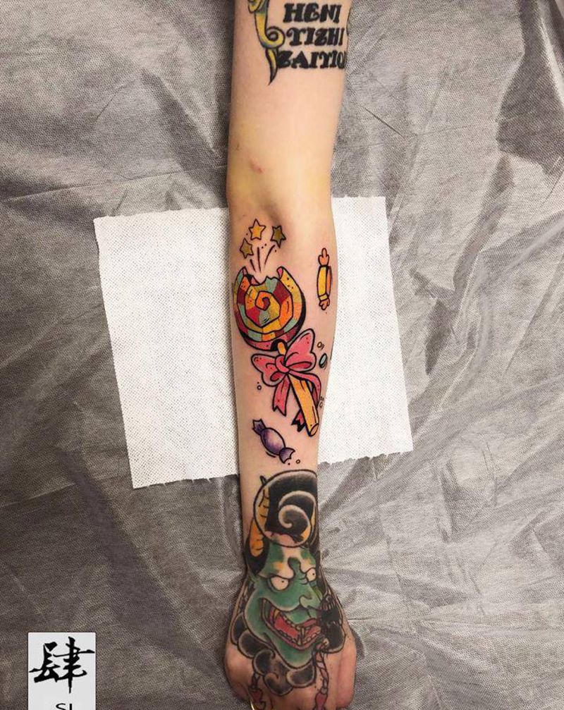 棒棒糖纹身图片_手臂New School卡通棒棒糖纹身图案