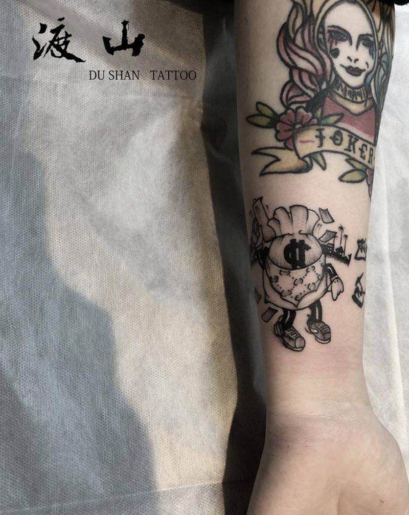 小图纹身图片_手臂钱袋纹身图案