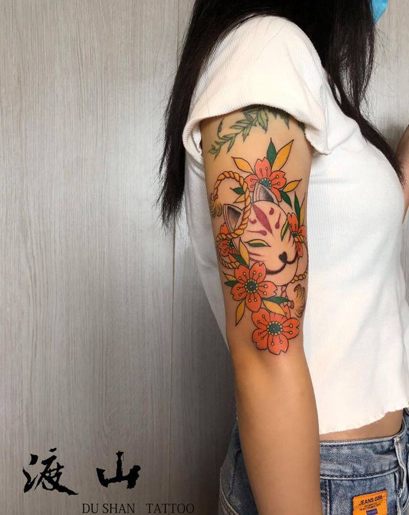 面具纹身图片_手臂老传统纹身图案