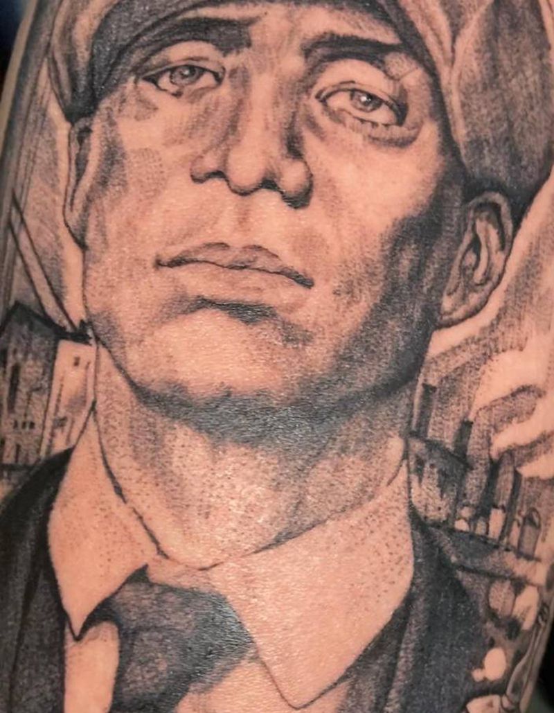 浴血黑帮题材纹身图片_手臂欧美写实纹身图案