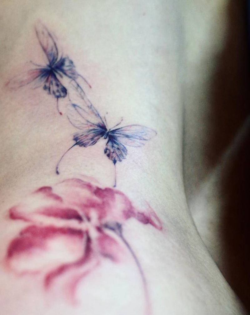 梦蝶纹身图片_背部水墨纹身图案