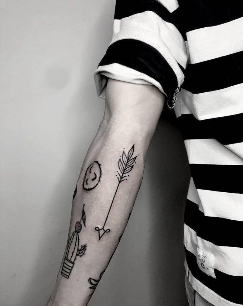 花臂拼接-箭头纹身图片_手臂点刺纹身图案