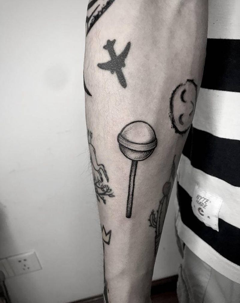 花臂拼接-棒棒糖纹身图片_手臂点刺纹身图案