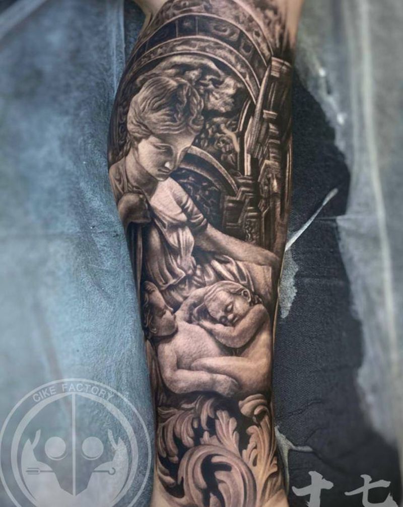 雕塑纹身图片_腿部欧美写实纹身图案