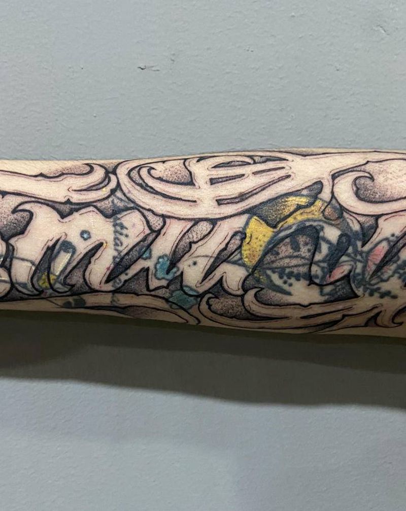 字纹身图片_手臂花体字纹身图案