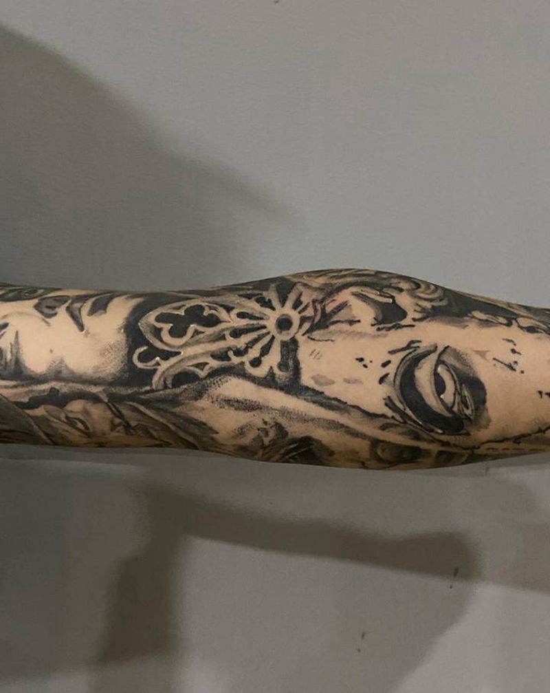 花臂纹身图片_手臂欧美写实纹身图案