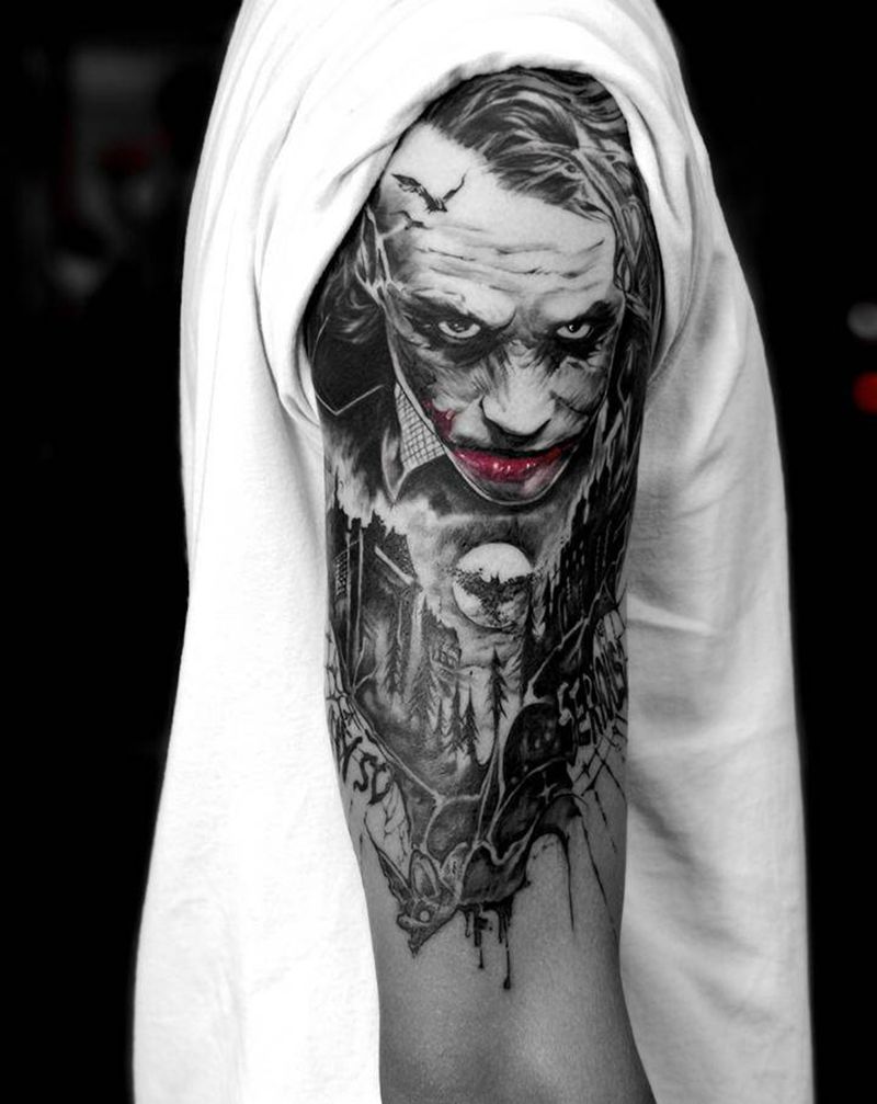 joker纹身图片_手臂欧美写实小丑蝙蝠纹身图案