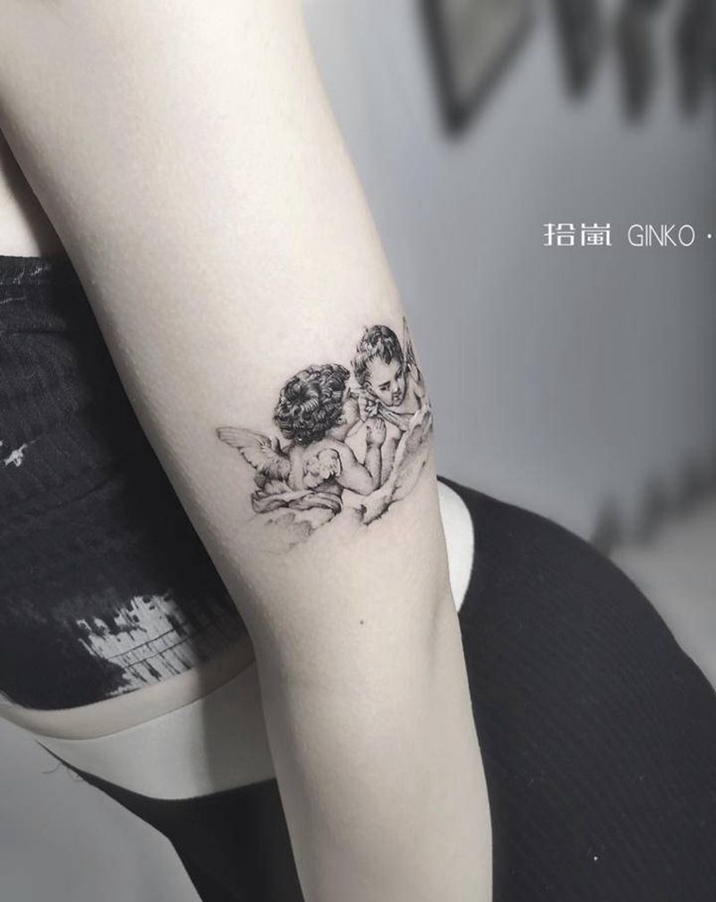 小天使纹身图片_手臂欧美写实纹身图案