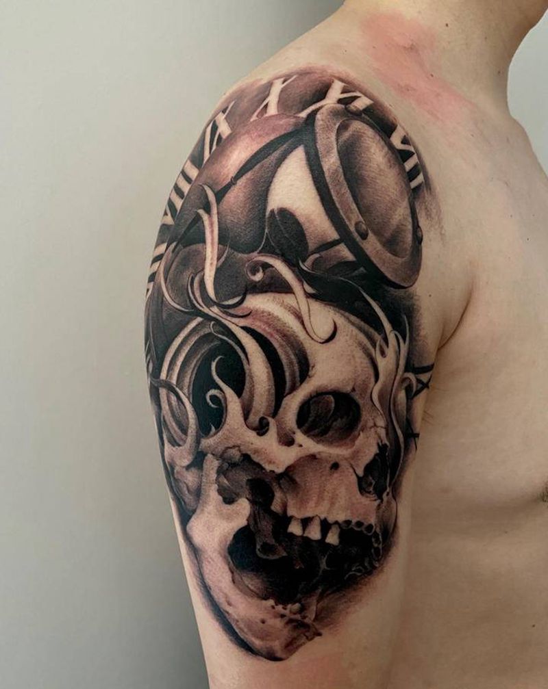 骷髅与沙漏纹身图片_手臂欧美写实纹身图案