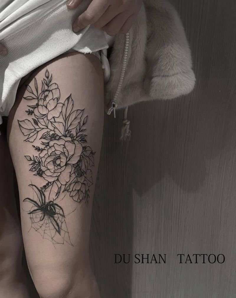 素花纹身图片_腿部点刺素花纹身图案