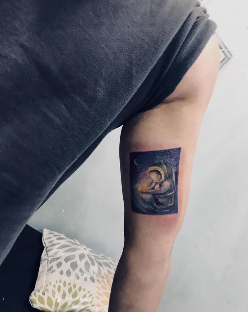 宇航员纹身图片_手臂纹身图案