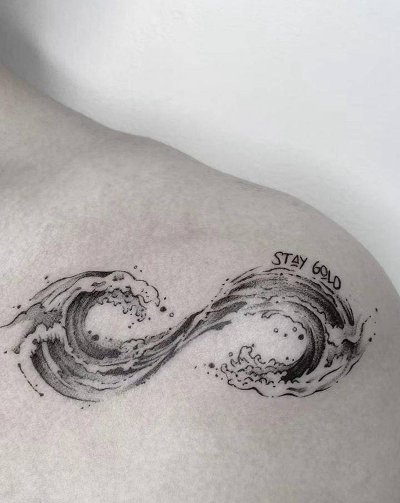 ∞纹身图片_胸部几何点刺纹身图案