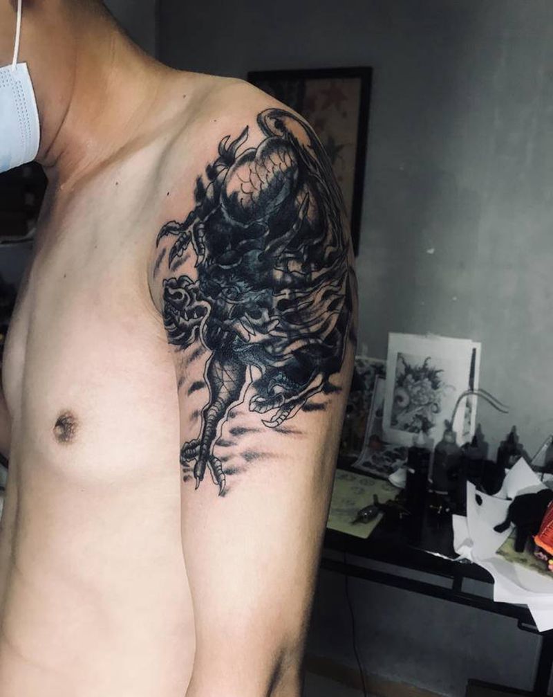 麒麟遮盖纹身图片_手臂纹身图案