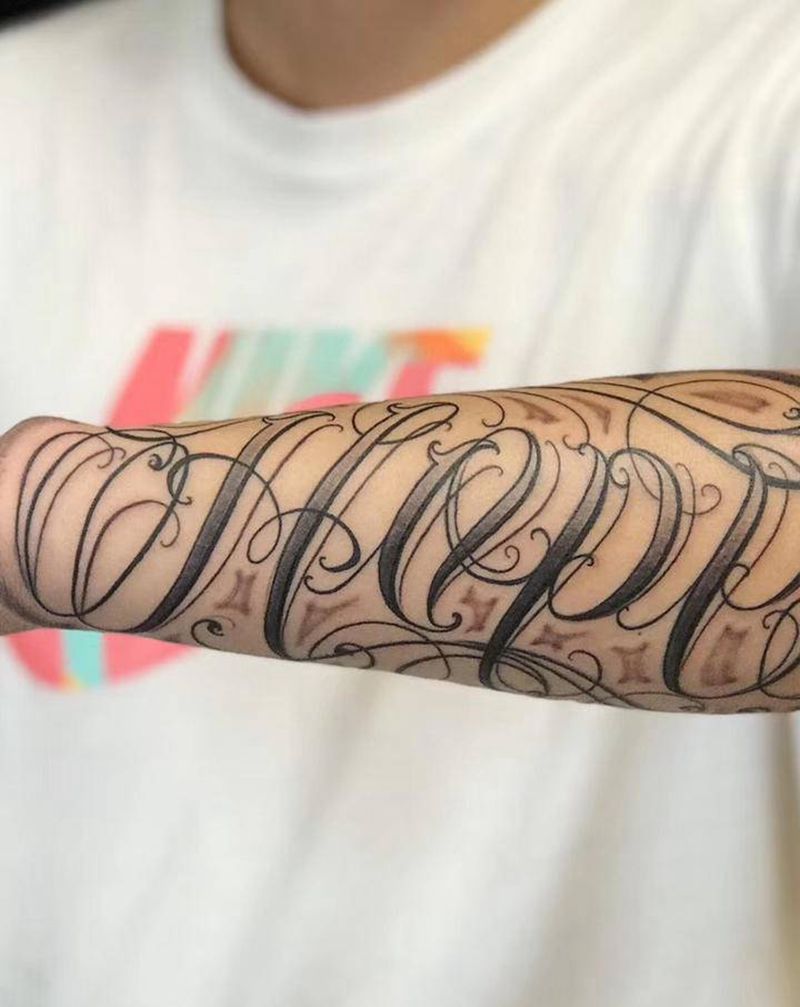 字体纹身图片_手臂花体字纹身图案
