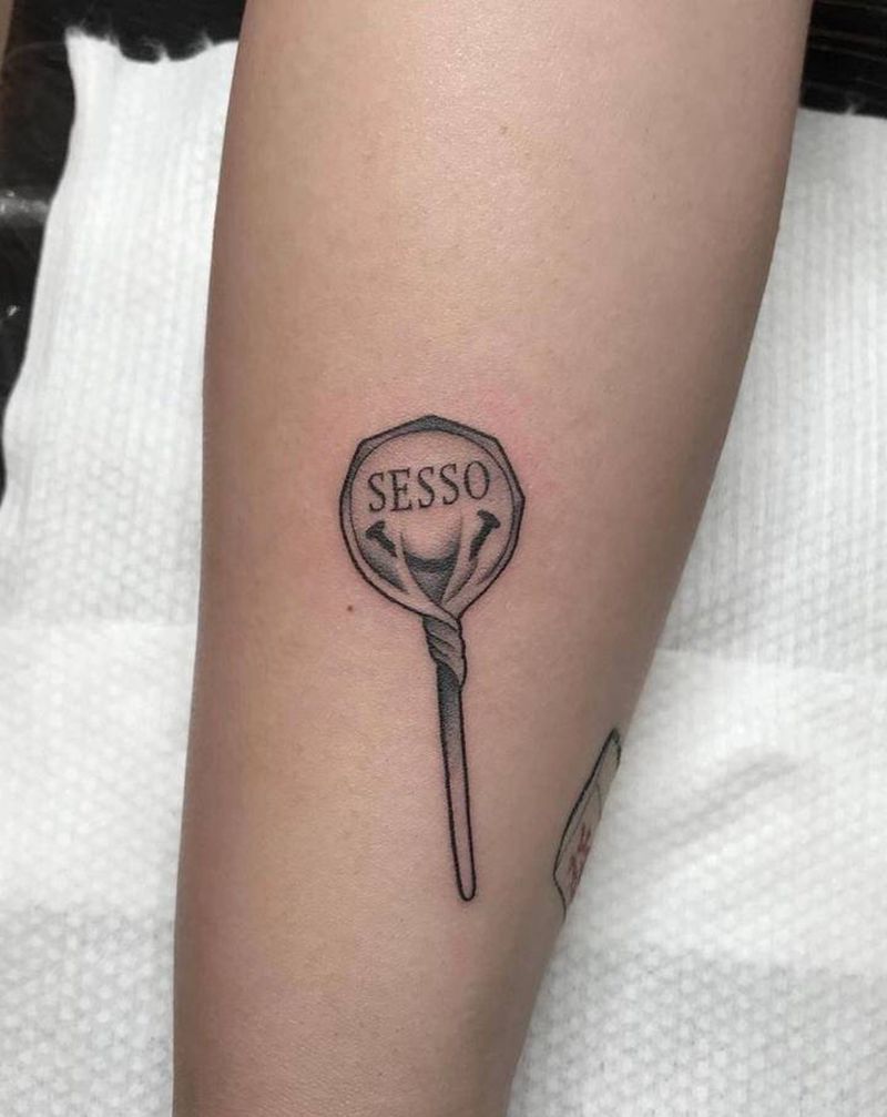 棒棒糖纹身图片_手臂纹身图案