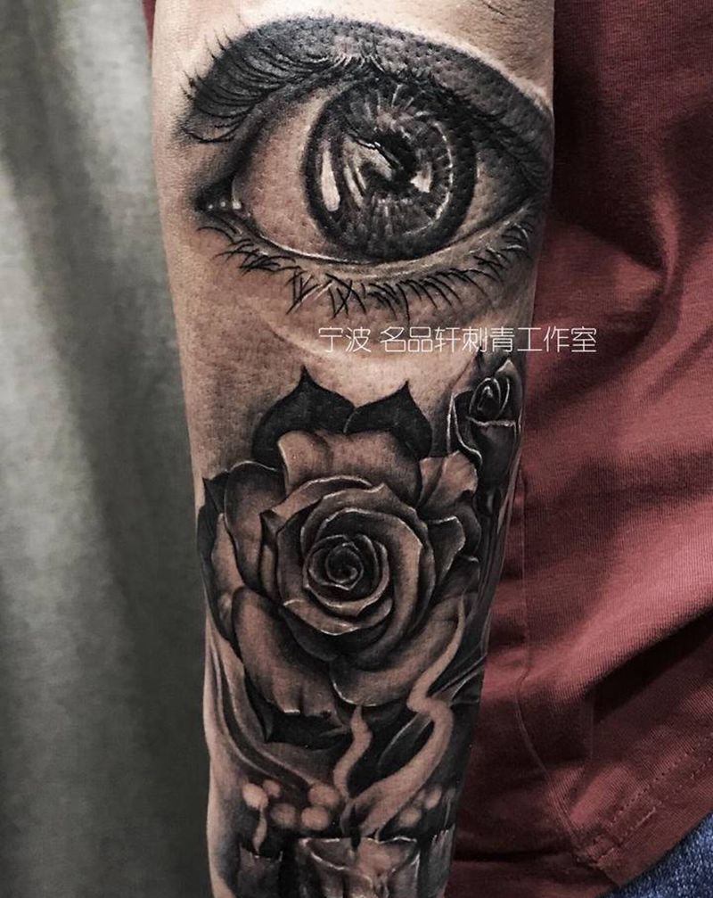 欧美写实纹身图片_手部手臂欧美写实玫瑰花眼睛蜡烛纹身图案