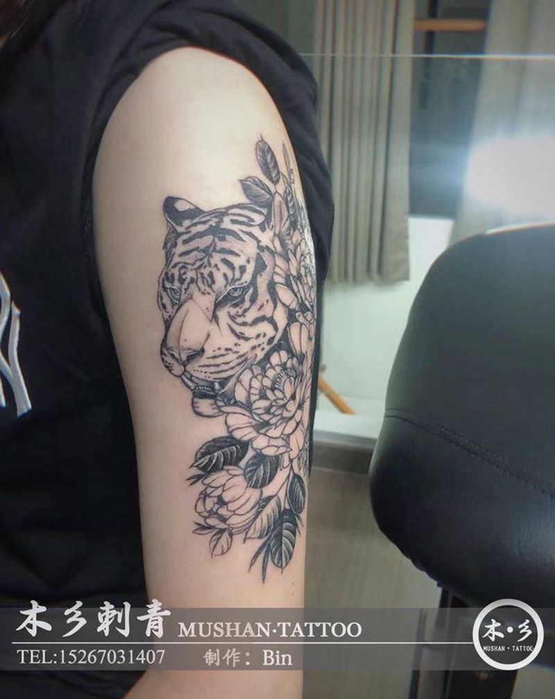 老虎纹身图片_手臂老虎纹身图案
