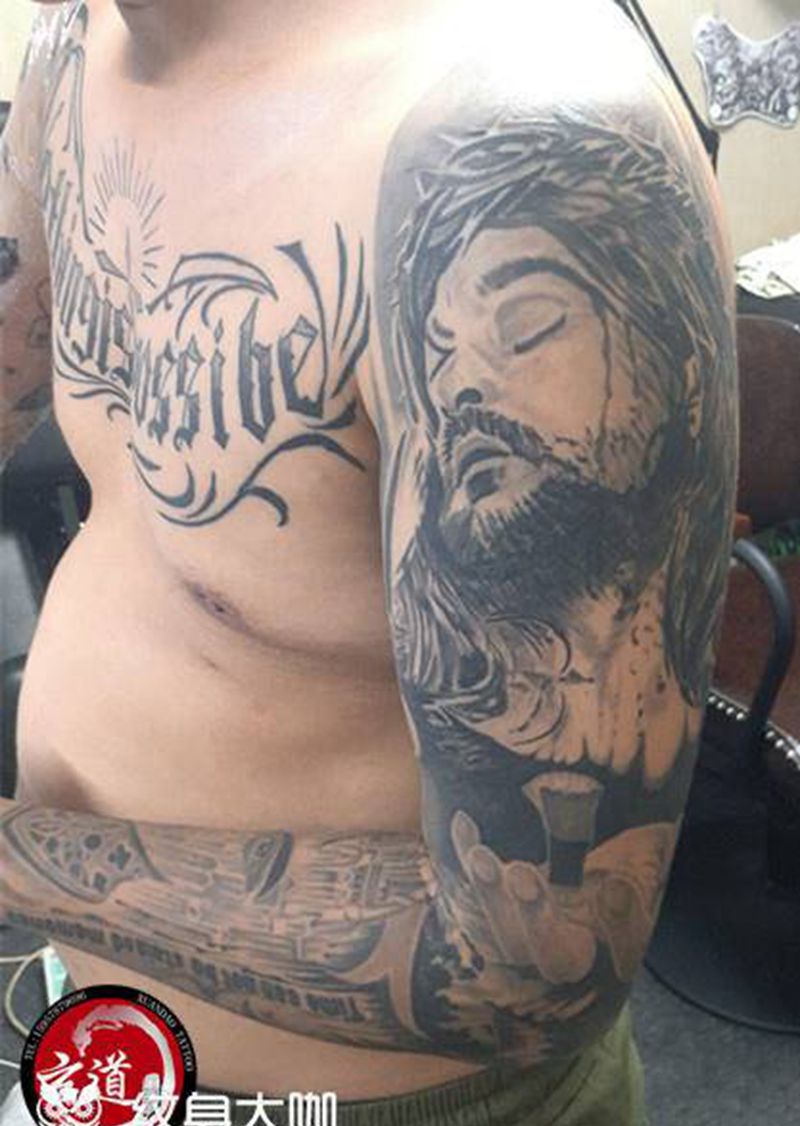 上帝纹身图片_手臂新传统水墨纹身图案