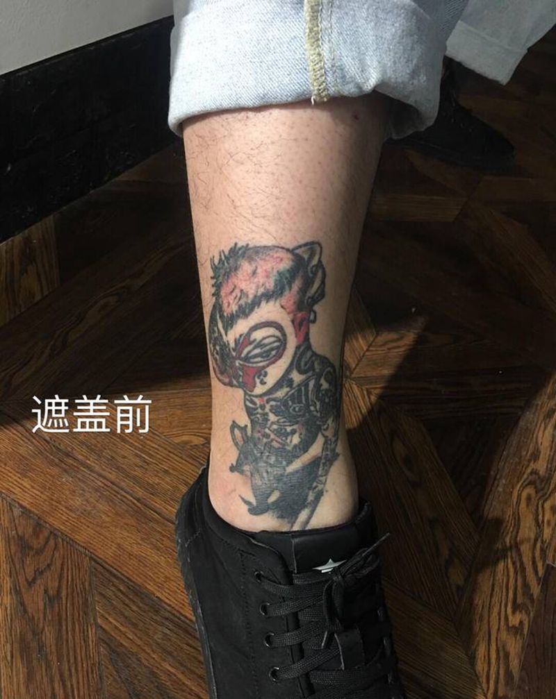 唐狮遮盖旧图纹身图片_腿部新传统唐狮子纹身图案