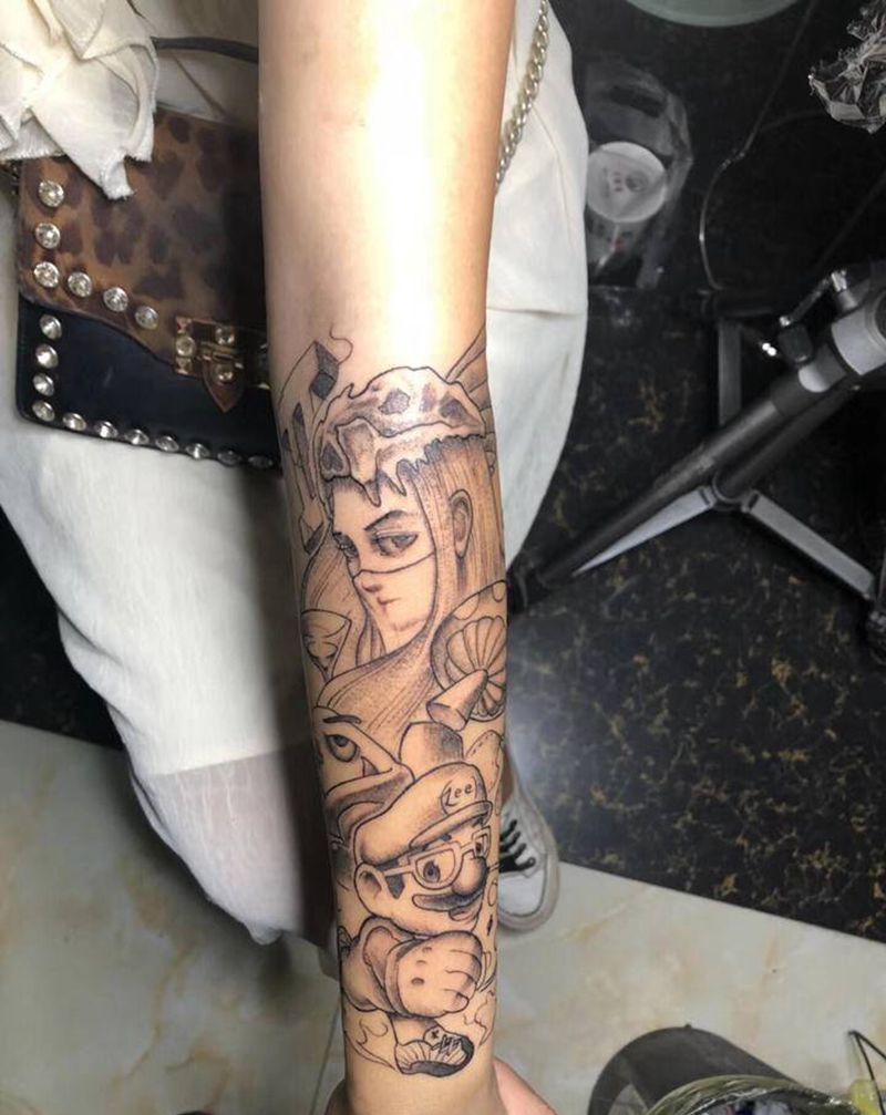 卡通纹身图片_手臂点刺纹身图案