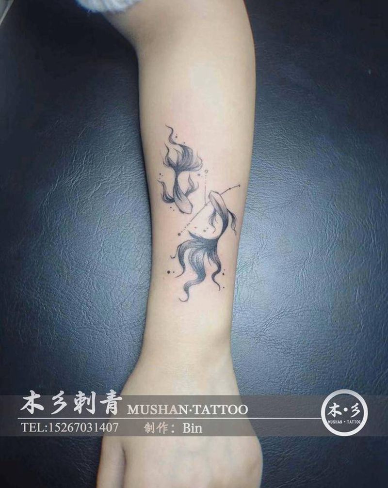 双鱼座纹身图片_手臂点刺纹身图案