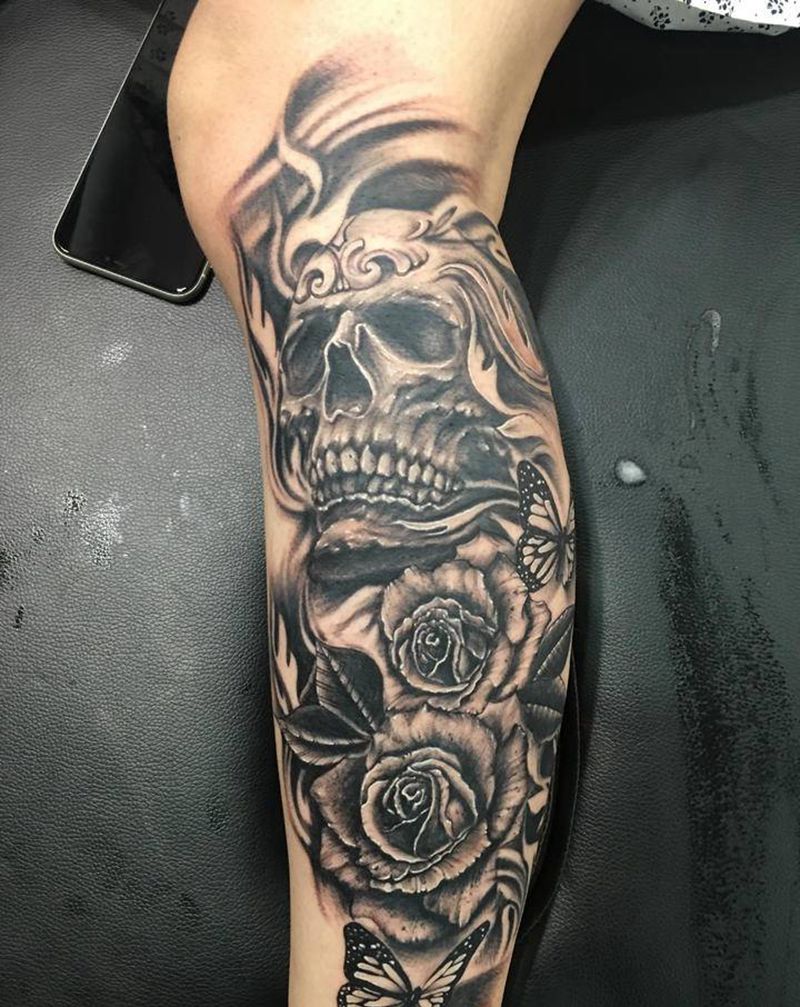 欧美风格纹身图片_腿部欧美写实骷髅玫瑰纹身图案