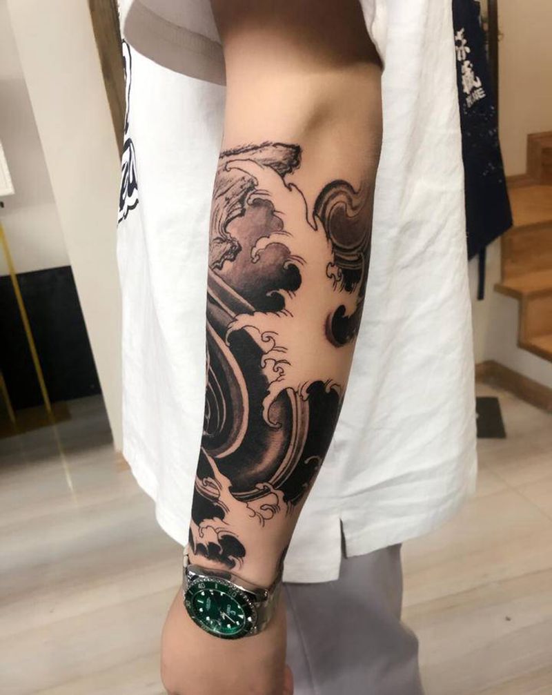 浪纹身图片_手臂纹身图案