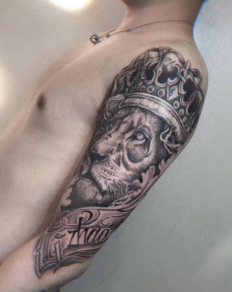 狮子纹身图片_手臂欧美写实纹身图案