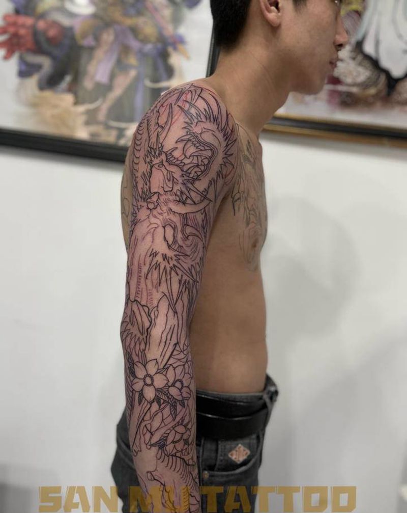 龙花臂纹身图片_手臂新传统纹身图案