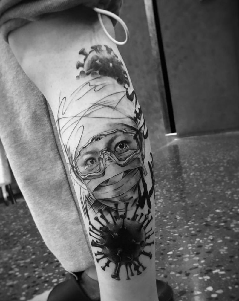 新冠之伤纹身图片_腿部欧美写实纹身图案