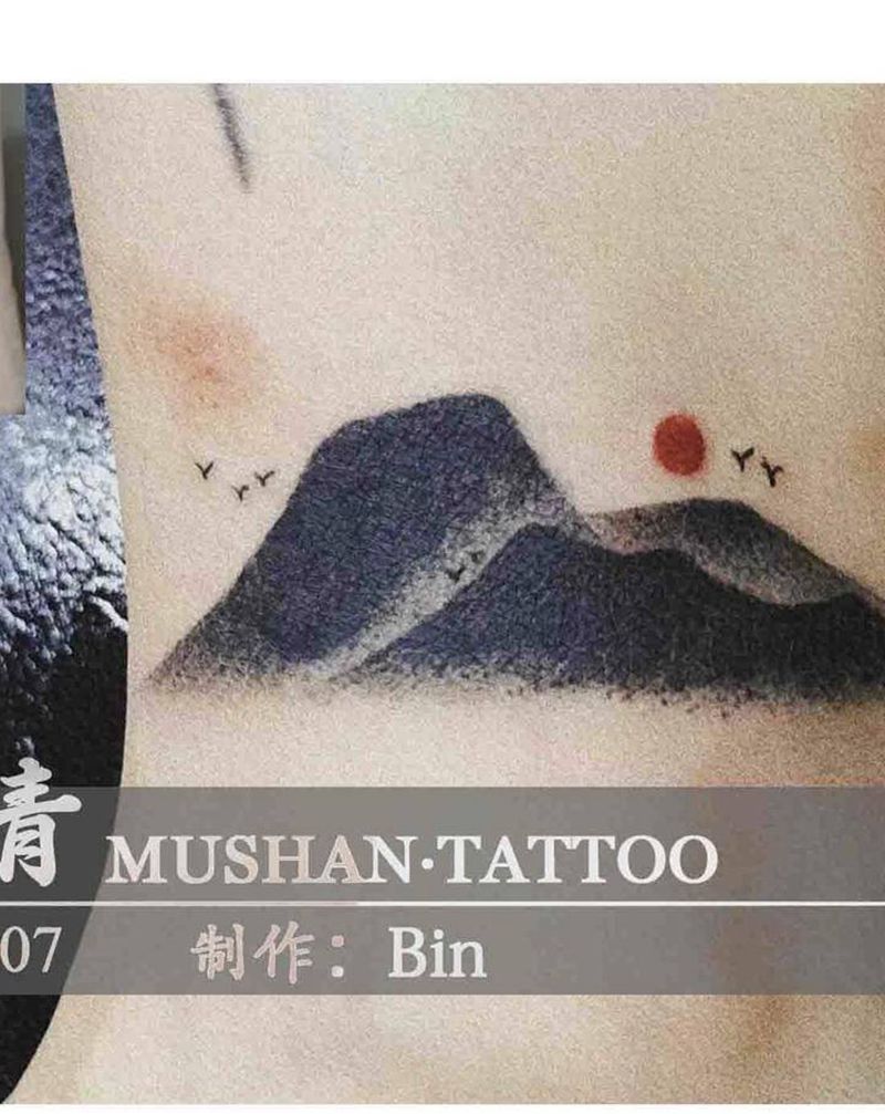 山水遮盖纹身图片_腿部纹身图案