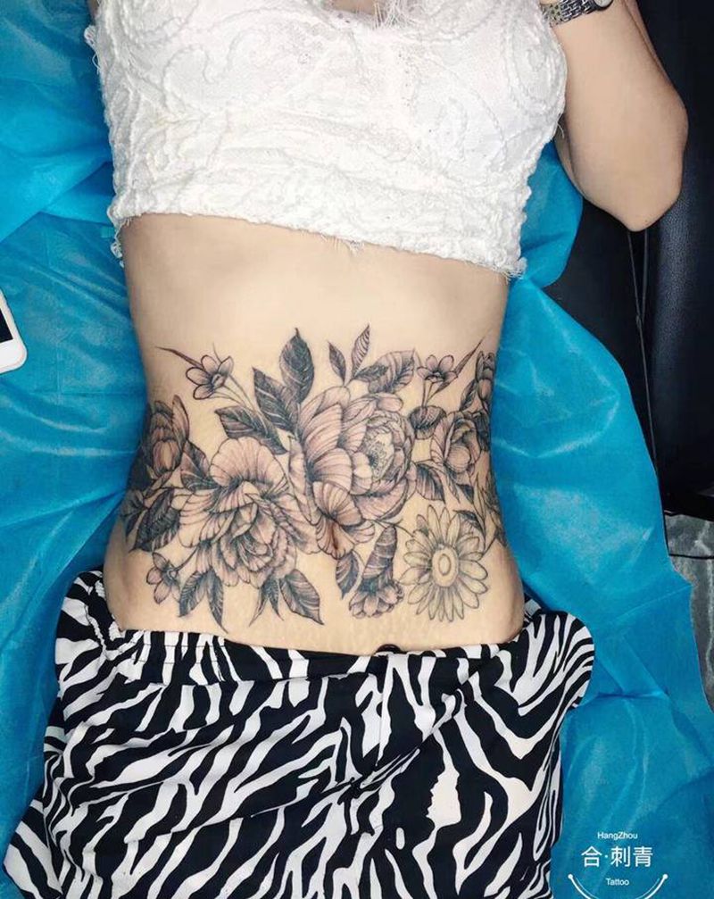 遮盖妊辰纹纹身图片_腹部点刺素花纹身图案
