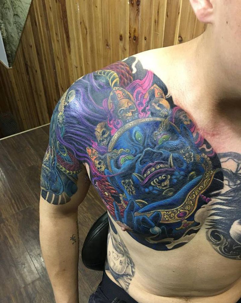 遮盖老式过肩龙纹身图片_胸部手臂新传统纹身图案