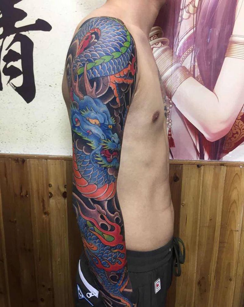 传统花臂-龙纹身图片_手臂新传统纹身图案