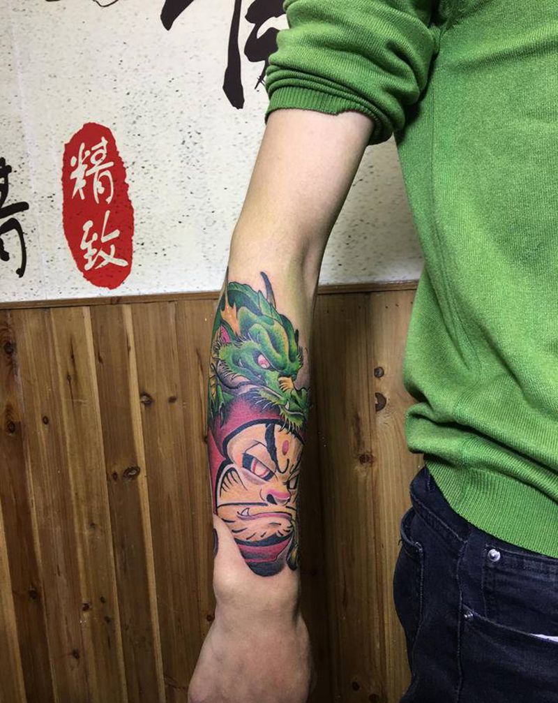 达摩纹身图片_手臂新传统纹身图案