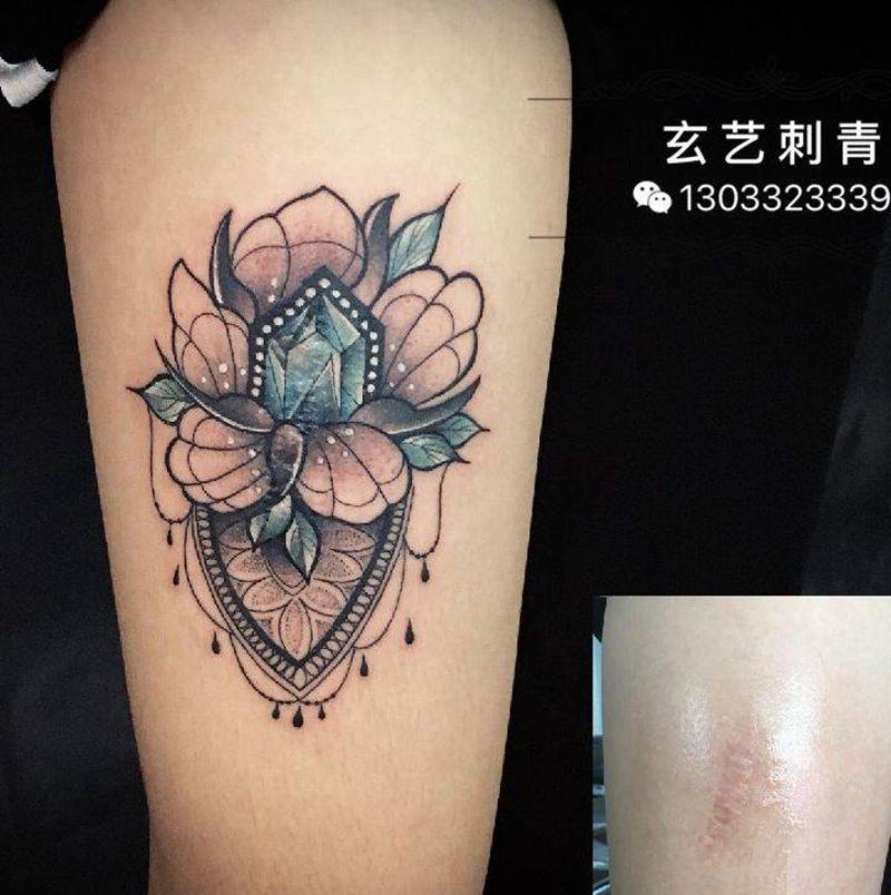 花纹身图片_腿部纹身图案