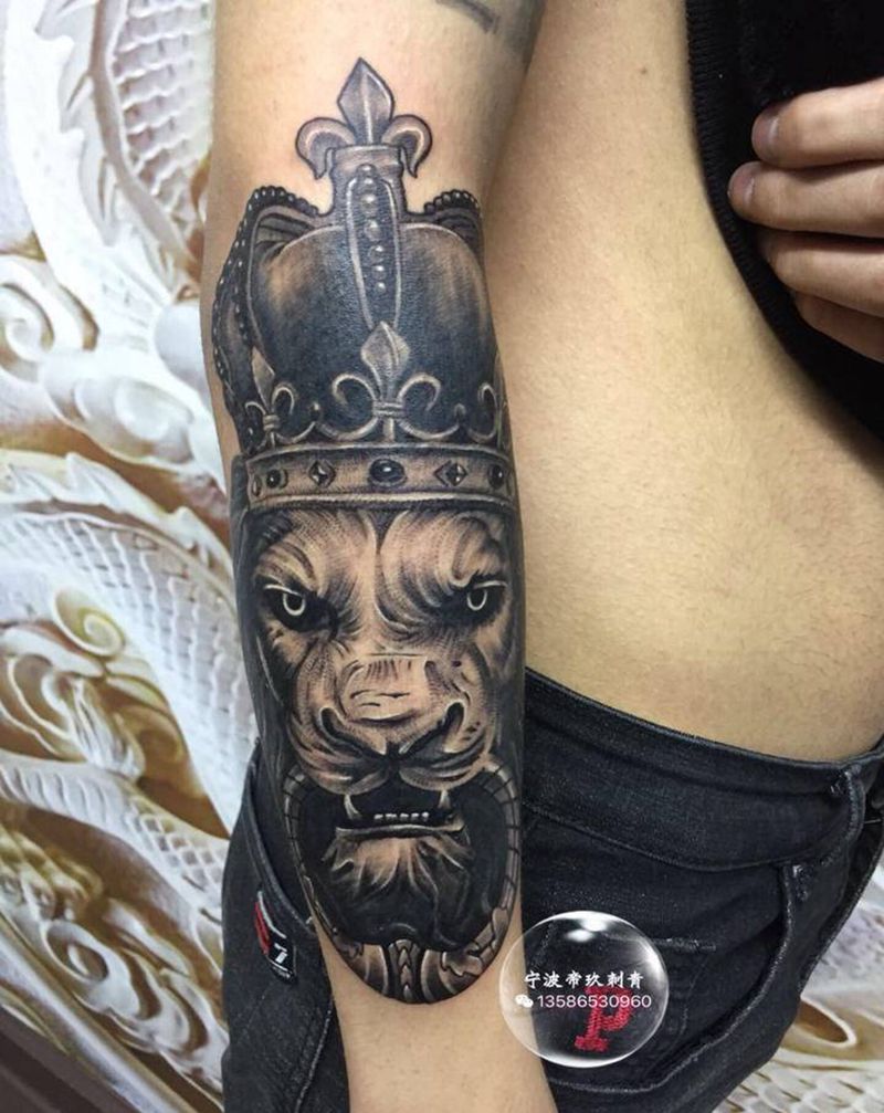 狮子纹身图片_手臂欧美写实纹身图案