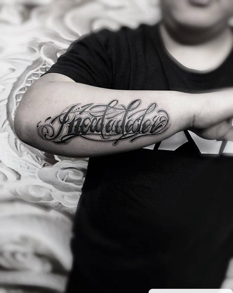 小臂奇卡诺纹身图片_手臂花体字纹身图案