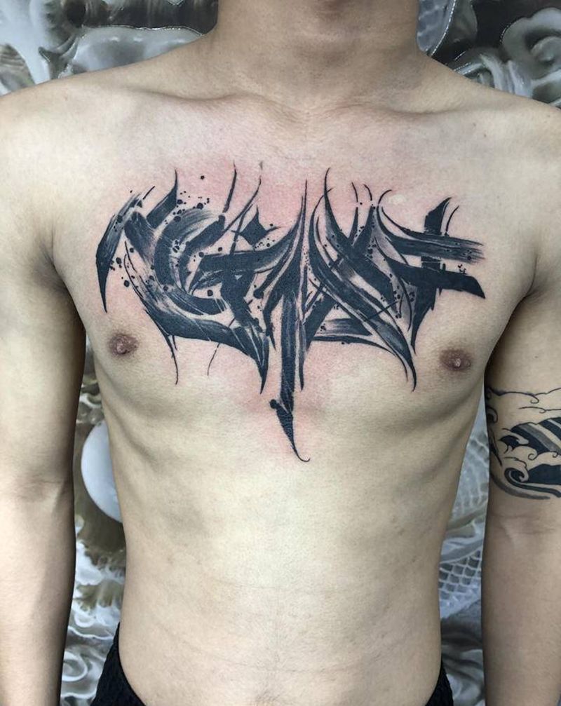 小花胸纹身图片_胸部花体字纹身图案