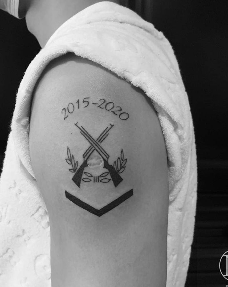 手枪纹身图片_手臂图腾几何纹身图案