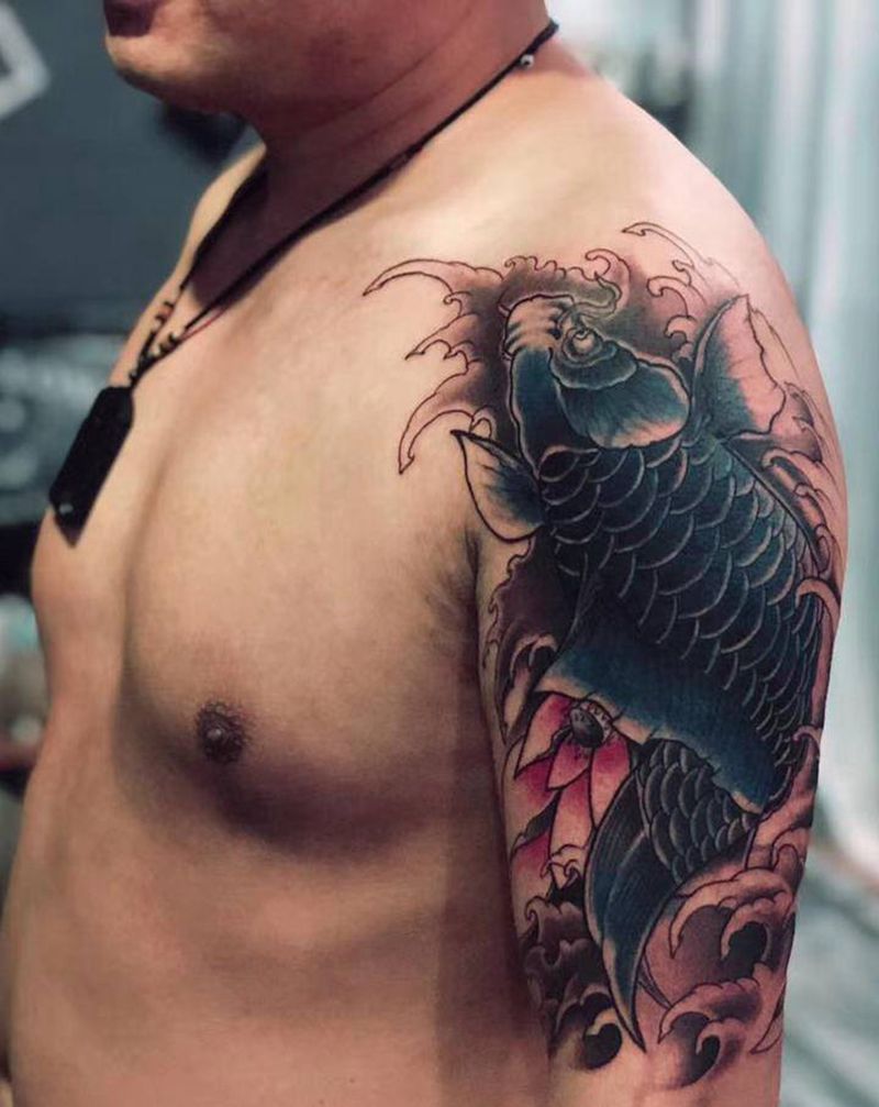 暴力环盖纹身图片_手臂纹身图案