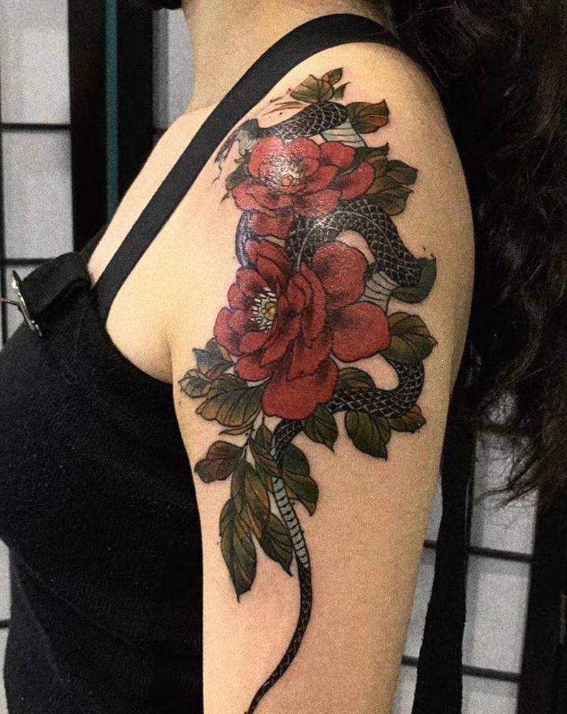 蛇与牡丹纹身图片_手臂纹身图案