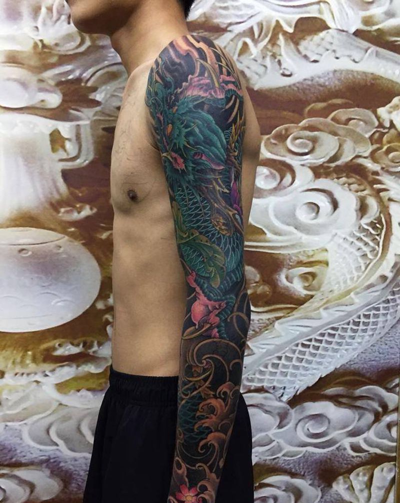 花臂暴力遮盖纹身图片_手臂新传统纹身图案