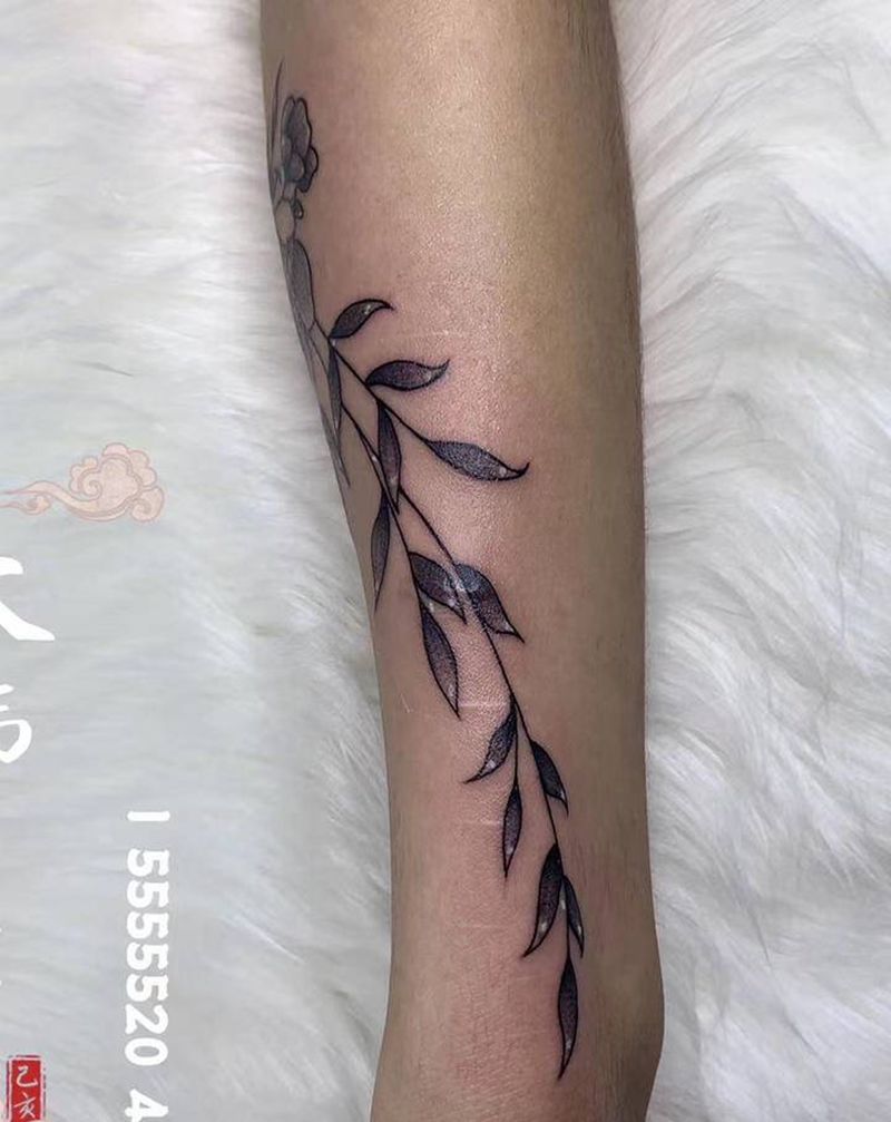 点刺小花纹身图片_手臂点刺花纹身图案