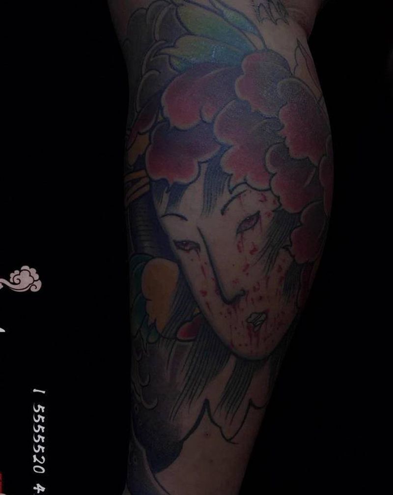 包小腿老传统生首纹身图片_腿部老传统纹身图案