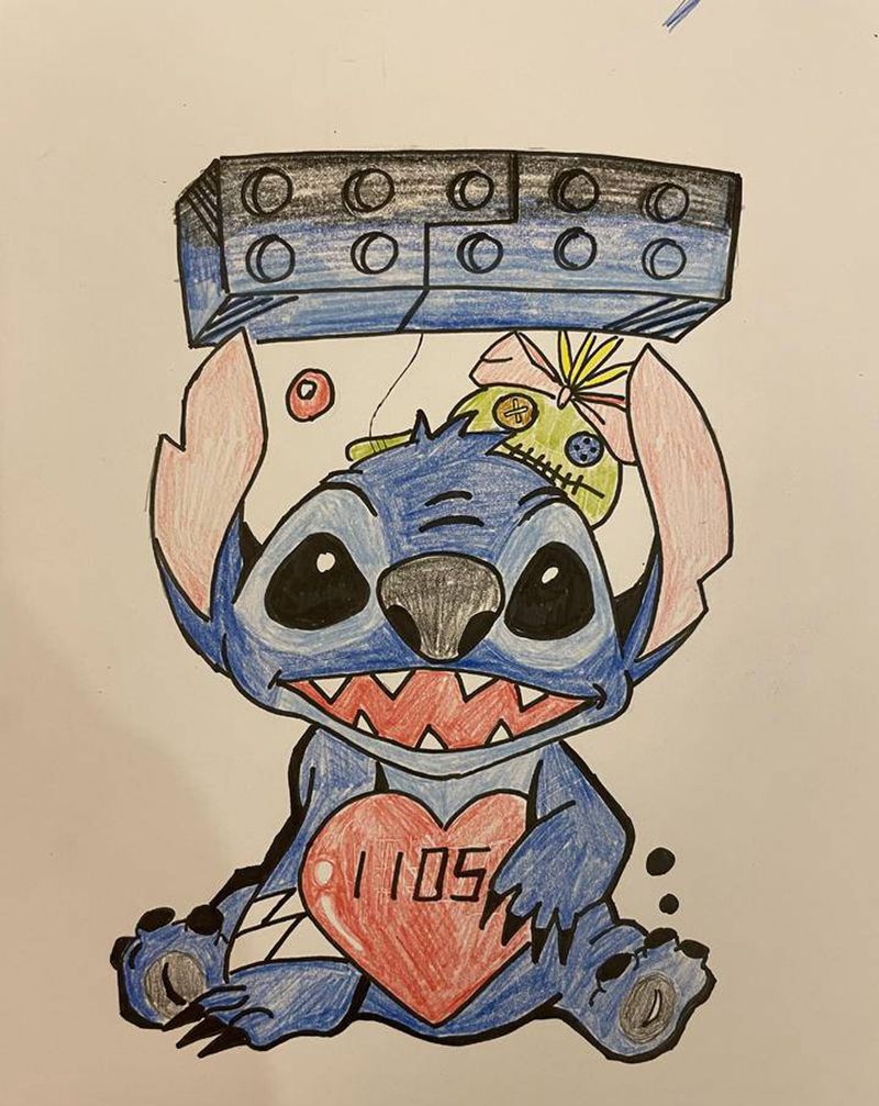 史迪仔遮盖纹身图片_手臂New School卡通史迪仔纹身图案