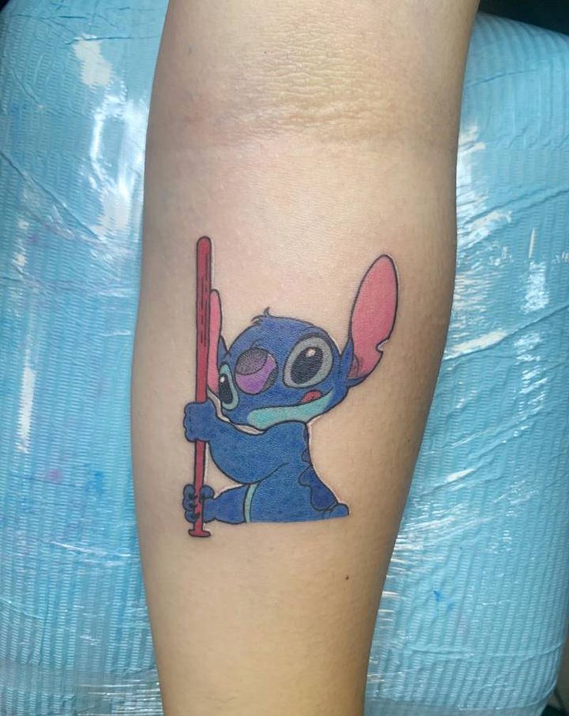 史迪仔纹身图片_手臂New School卡通史迪仔纹身图案