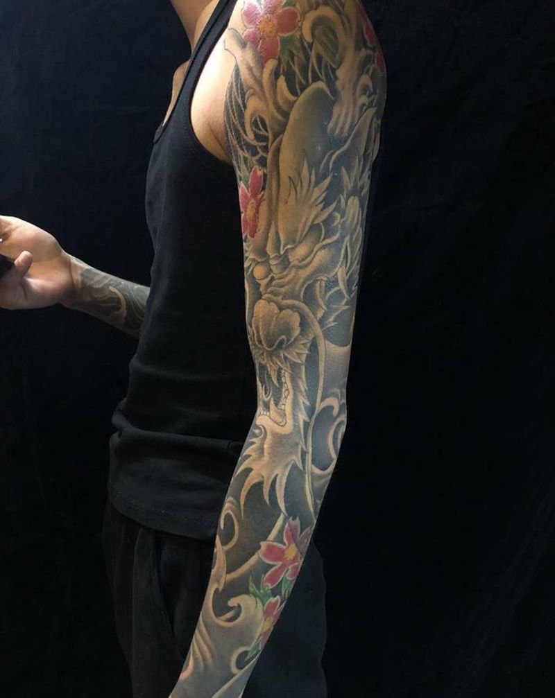 花臂纹身图片_手臂老传统纹身图案