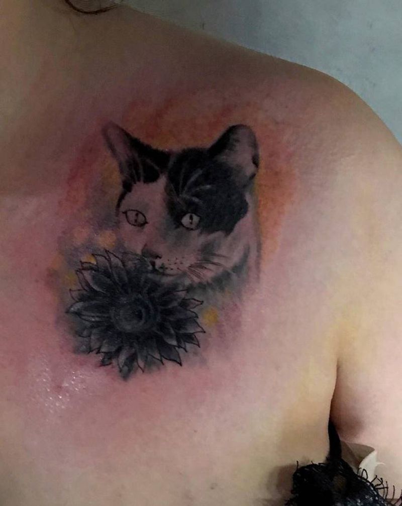 遮盖纹身图片_胸部纹身图案