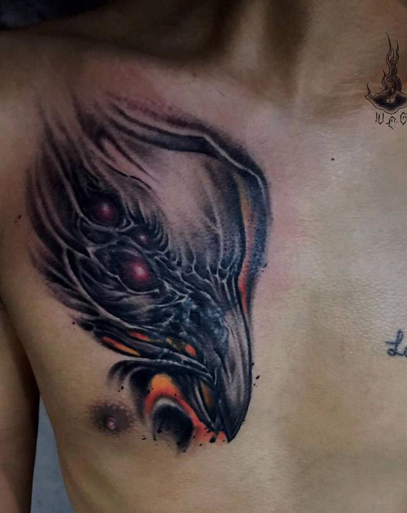 乌鸦遮盖纹身图片_胸部纹身图案